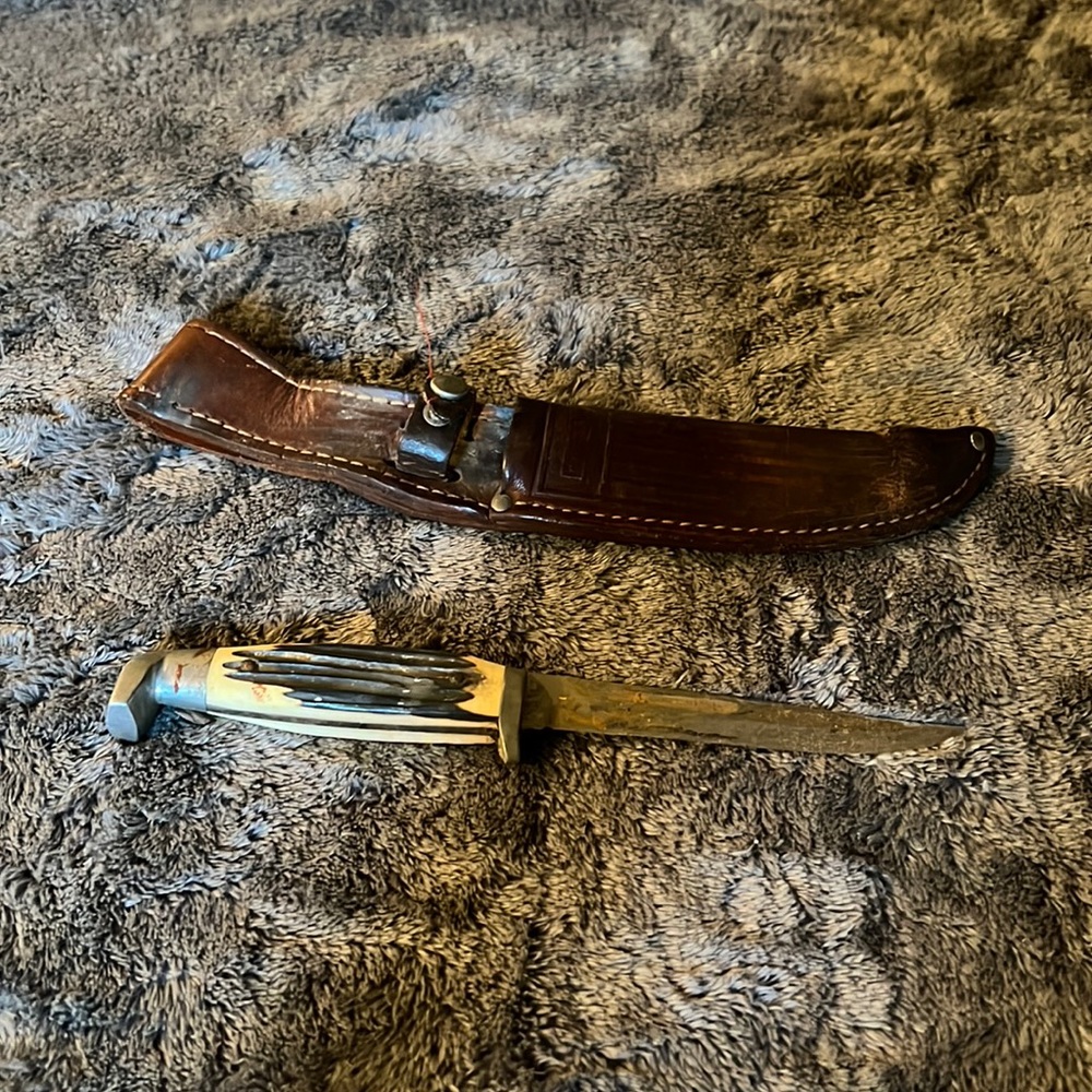 Old fixed blade with sheath